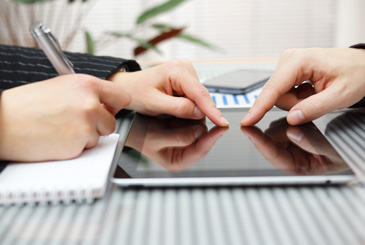 People working with digital tablet during a business meeting