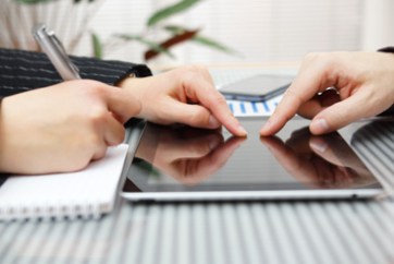 People working with digital tablet during a business meeting