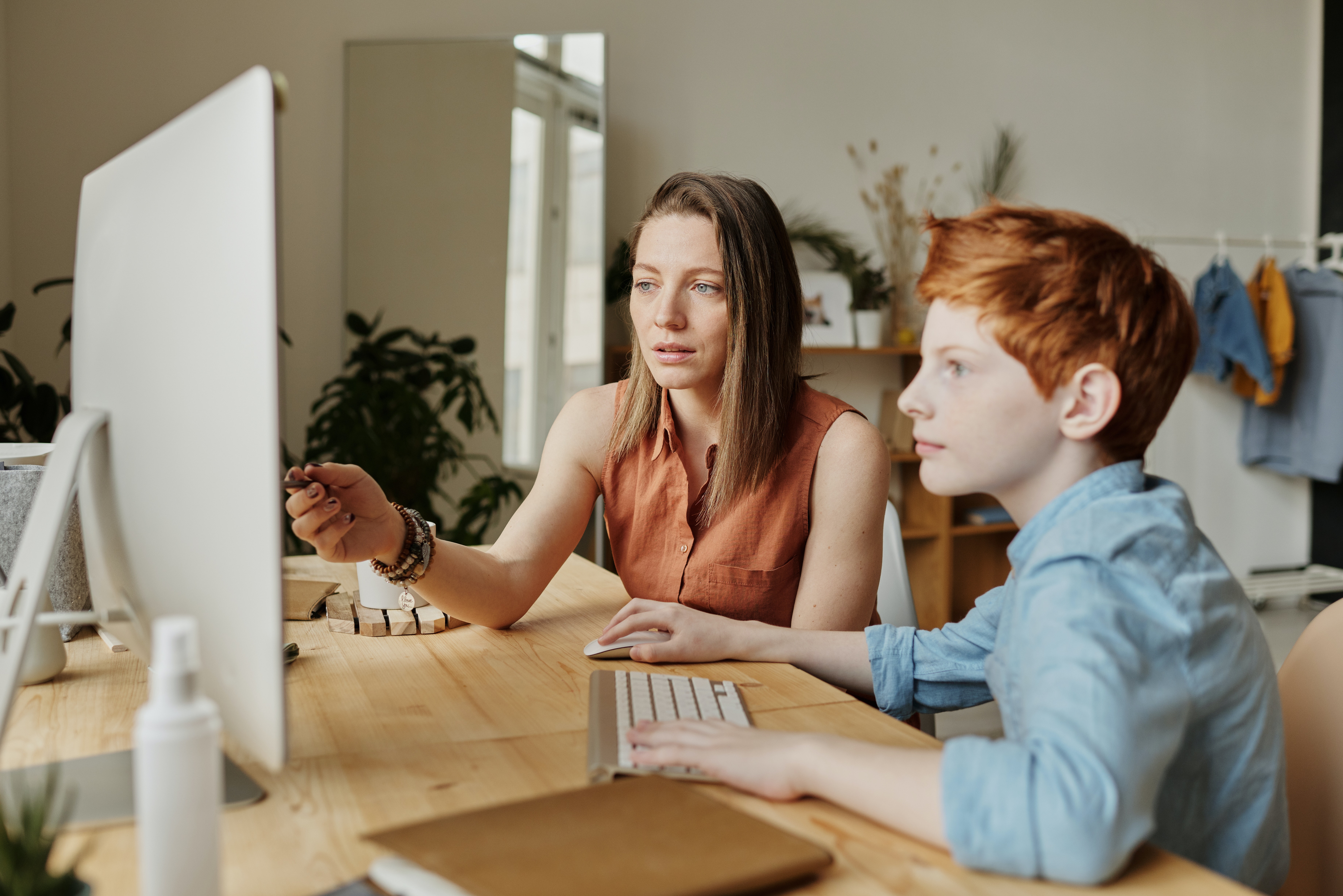 Parent and child at computer
