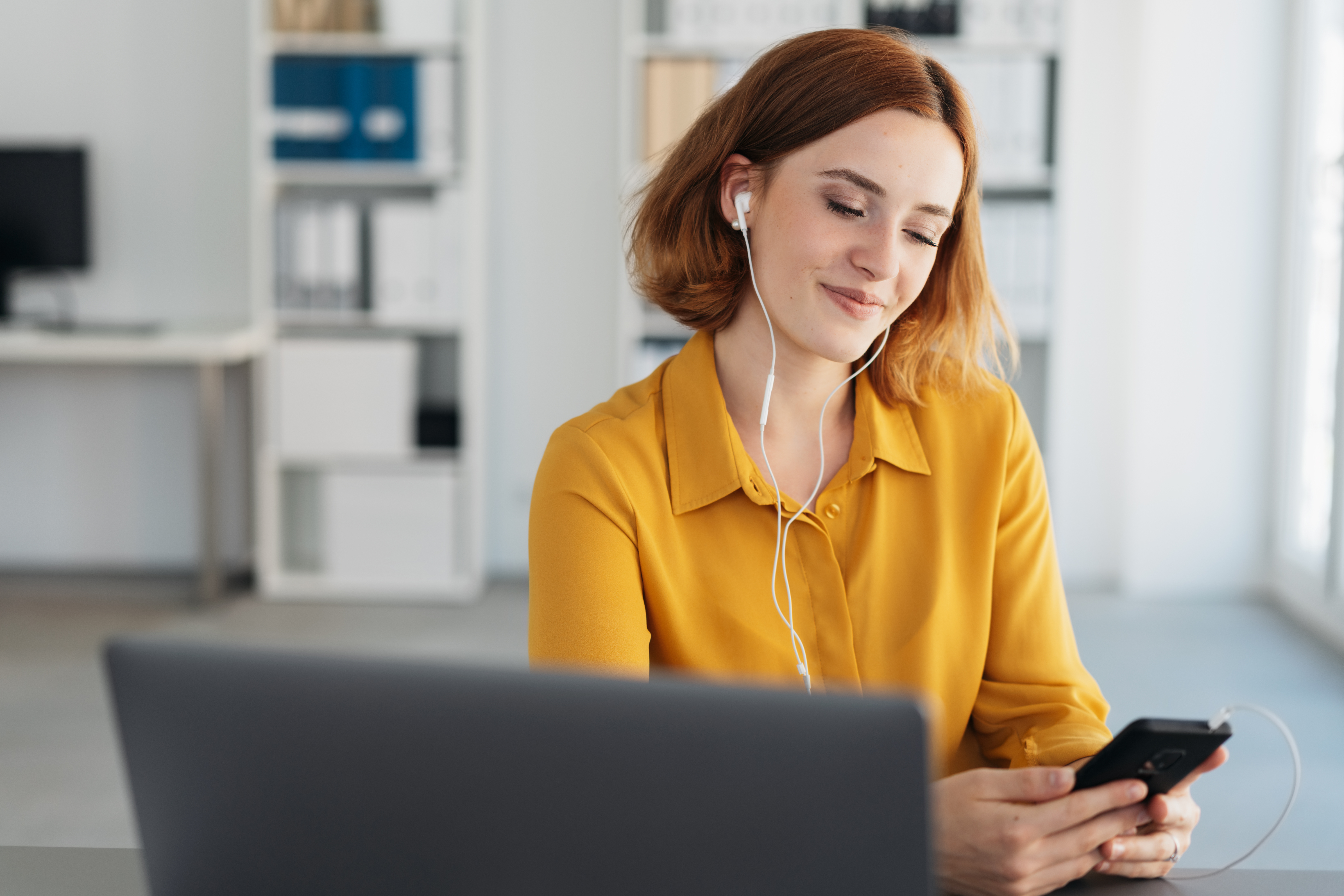 Employee listening to music