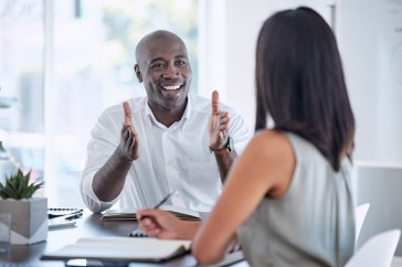 Manager and employee talking