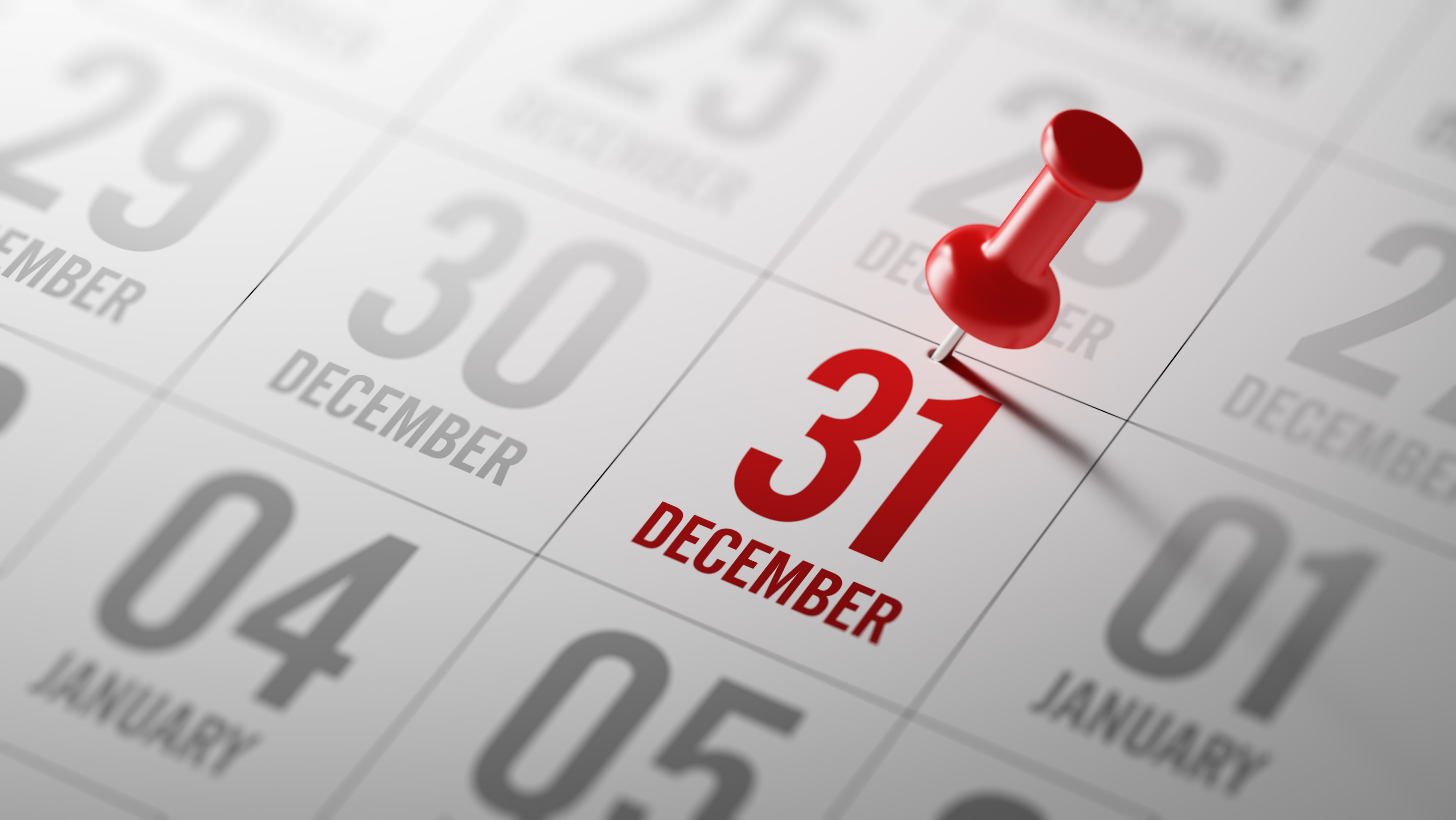 December calendar with a red thumbtack on the last day of the year