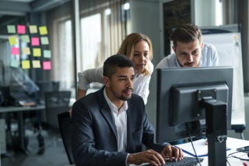 Employees working at computer