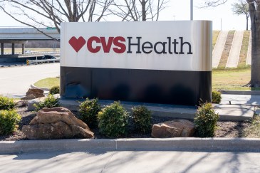 CVS Health sign in front of their corporate office, just off a freeway.