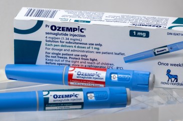 Two Ozempic injection pens and the box.