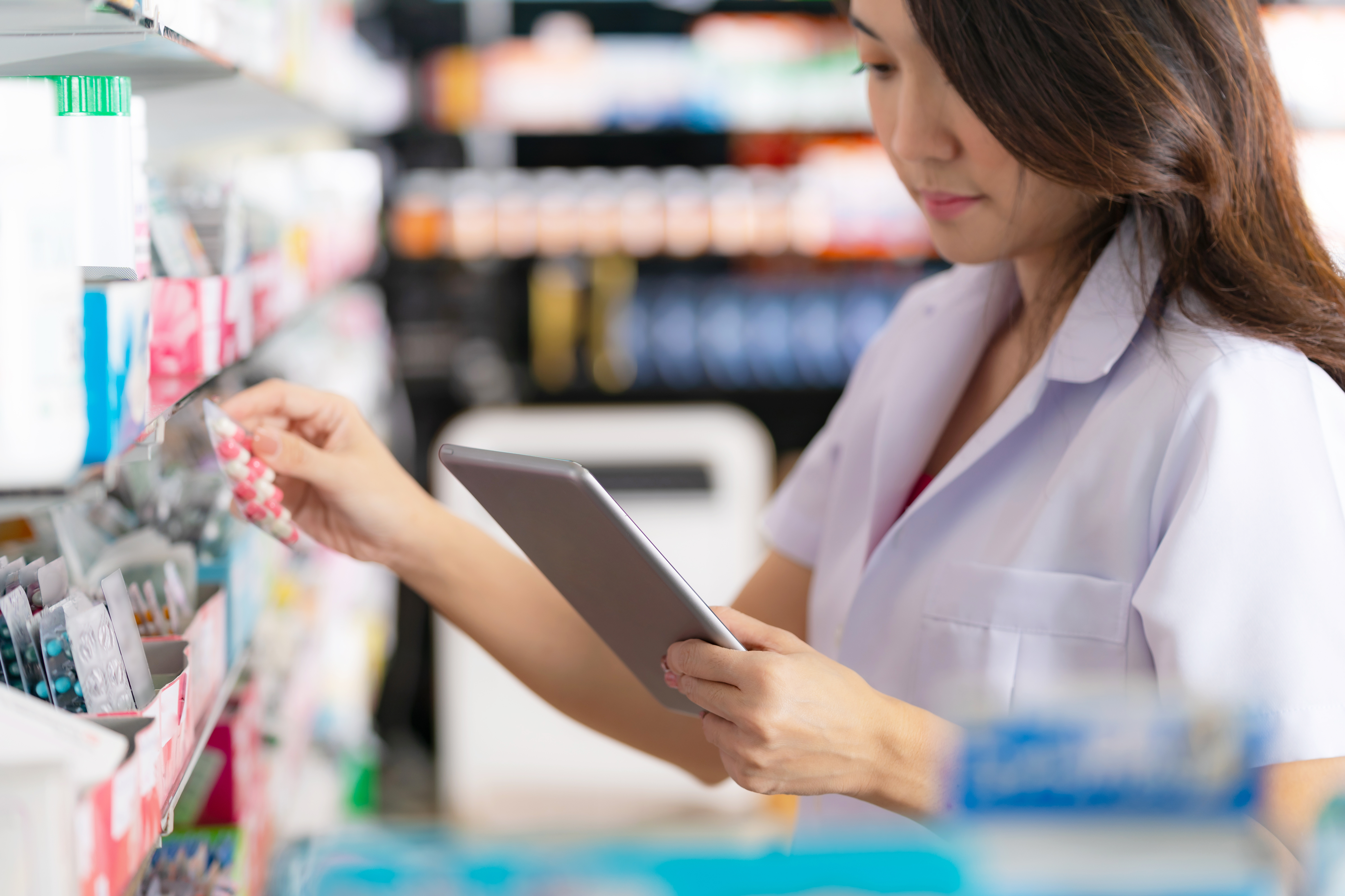 Pharmacist organizing pills