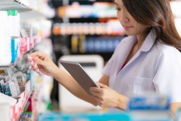 Pharmacist organizing pills