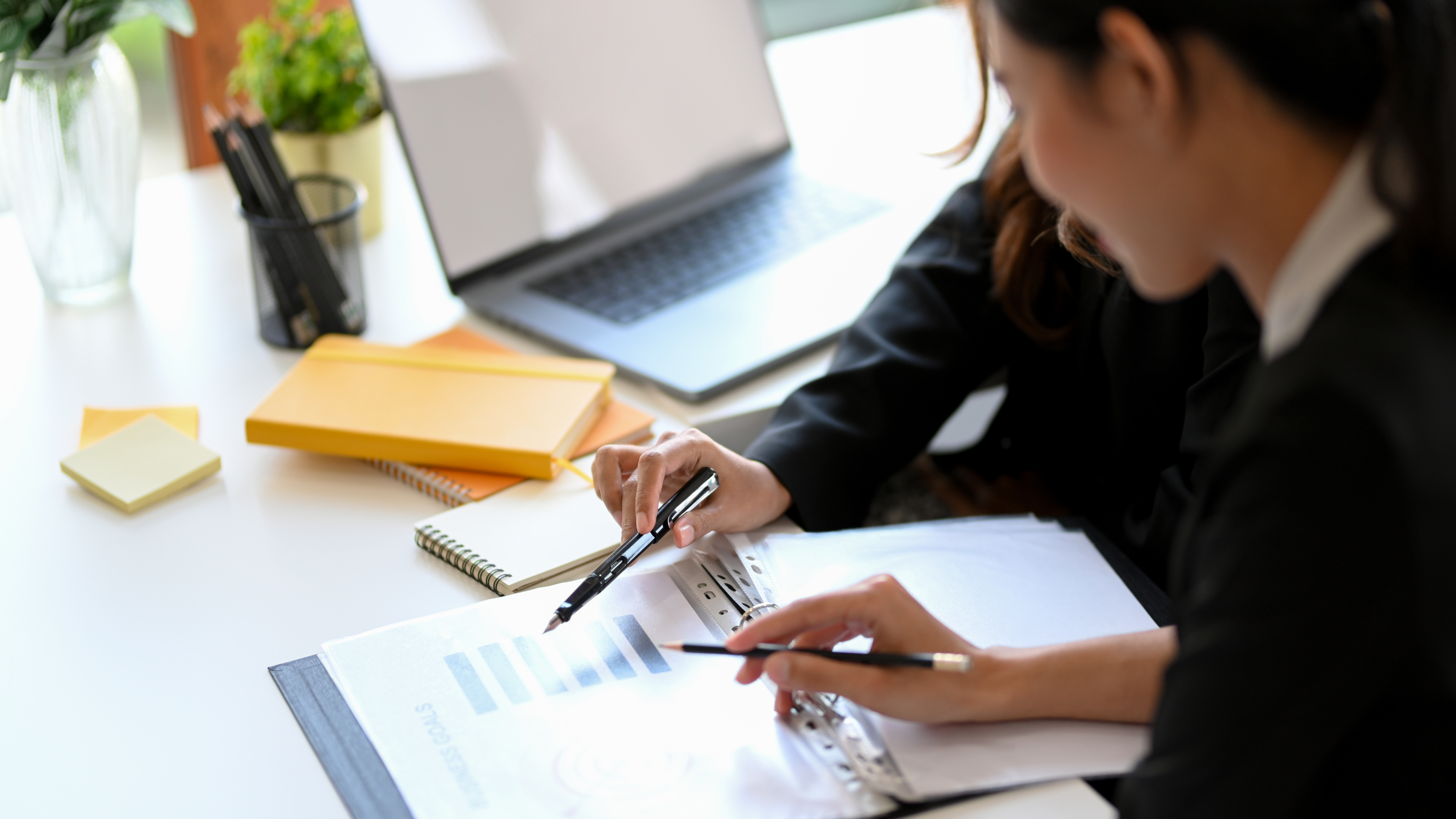 Women going over financial document together.