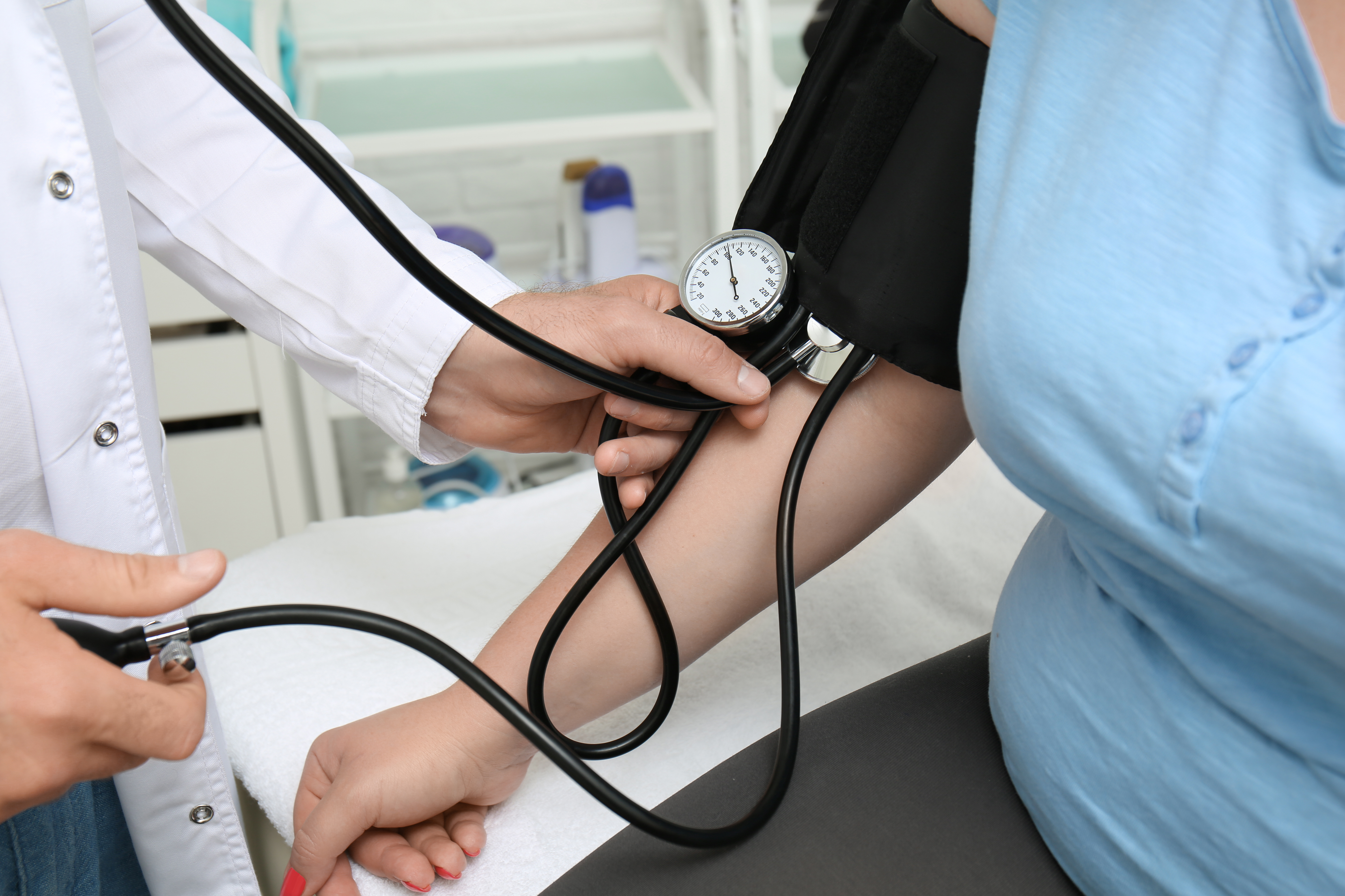 Woman getting blood pressure taken