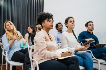 Employees sitting in on a training.