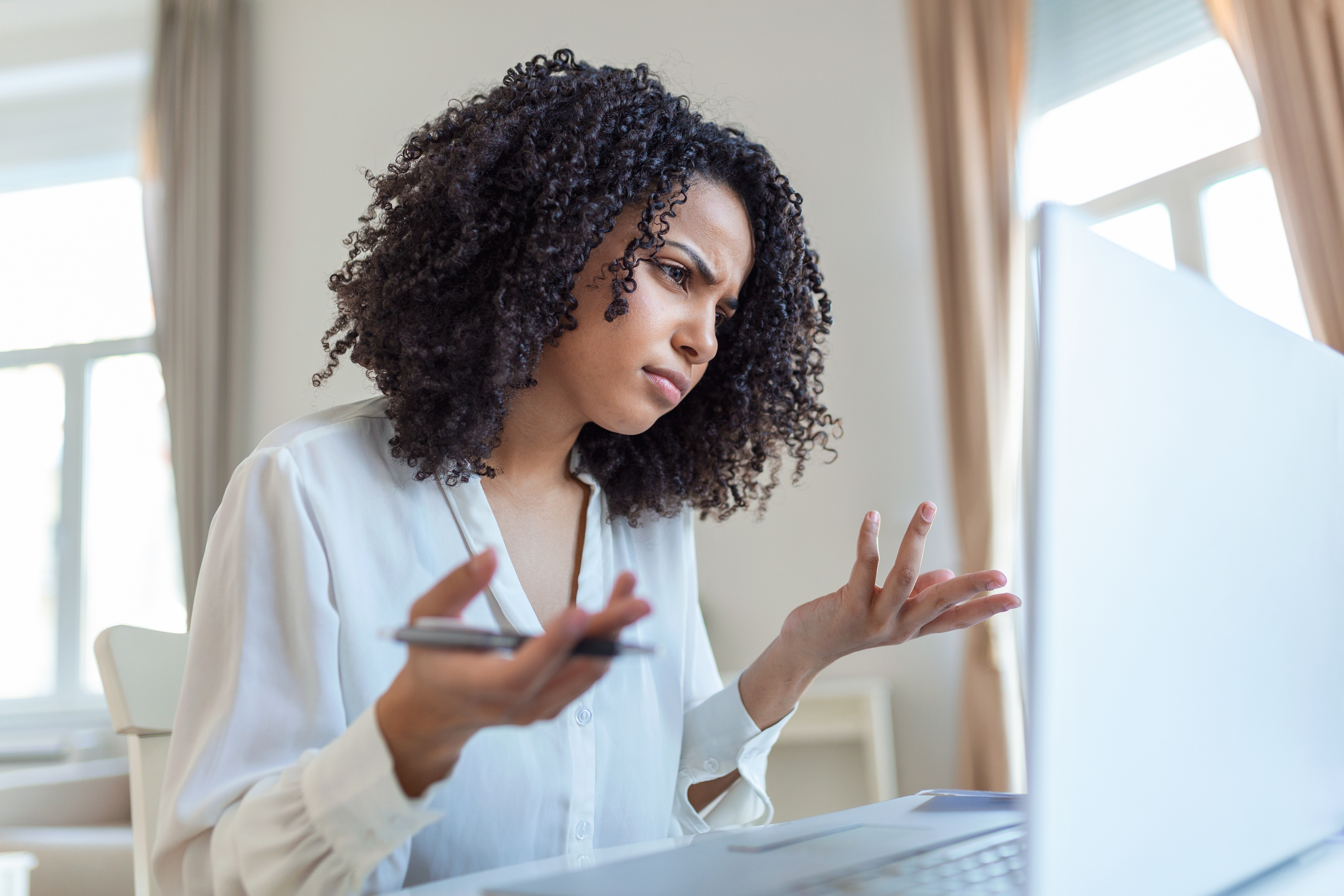 Woman frustrated while searching for jobs.