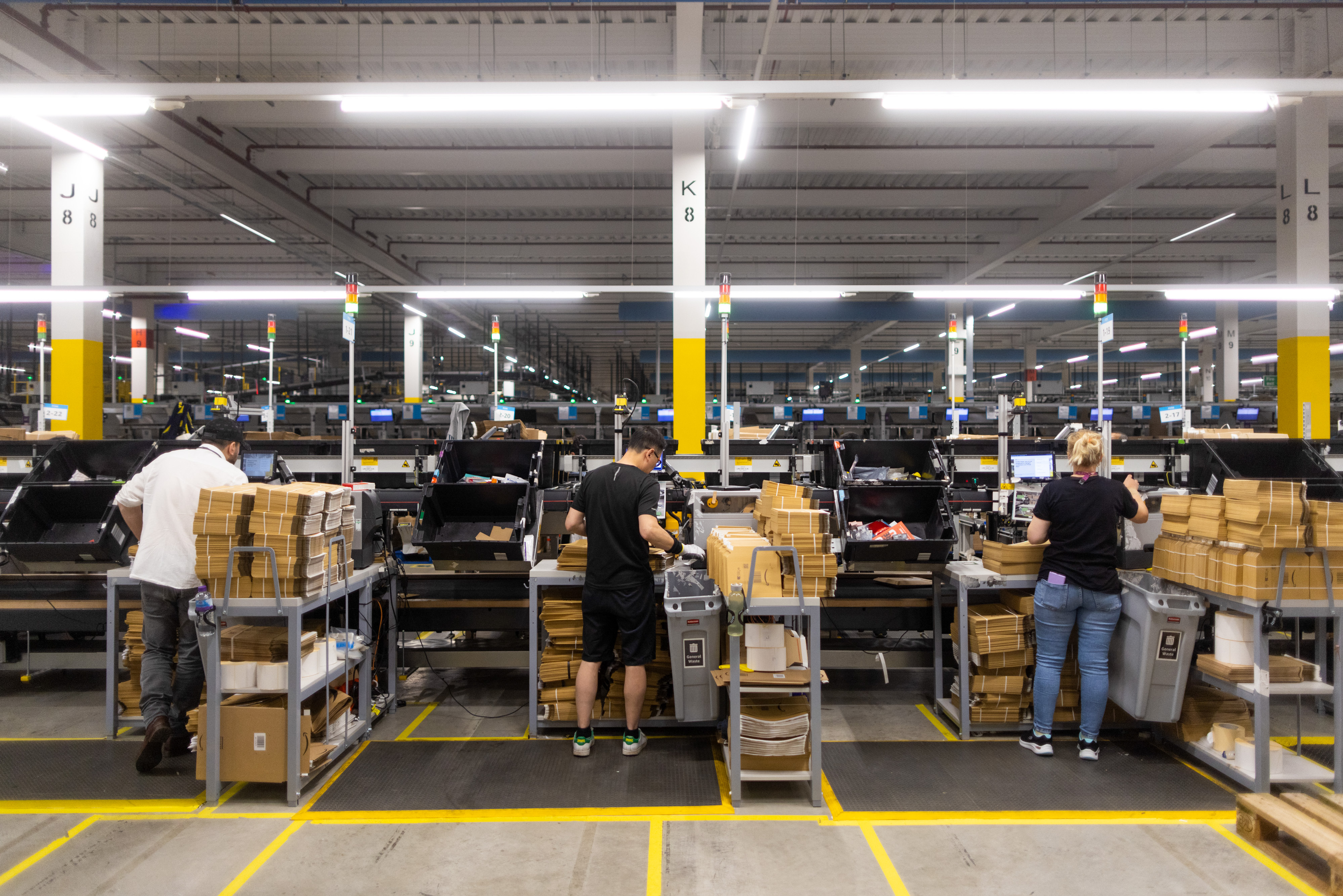 Workers in an Amazon warehouse