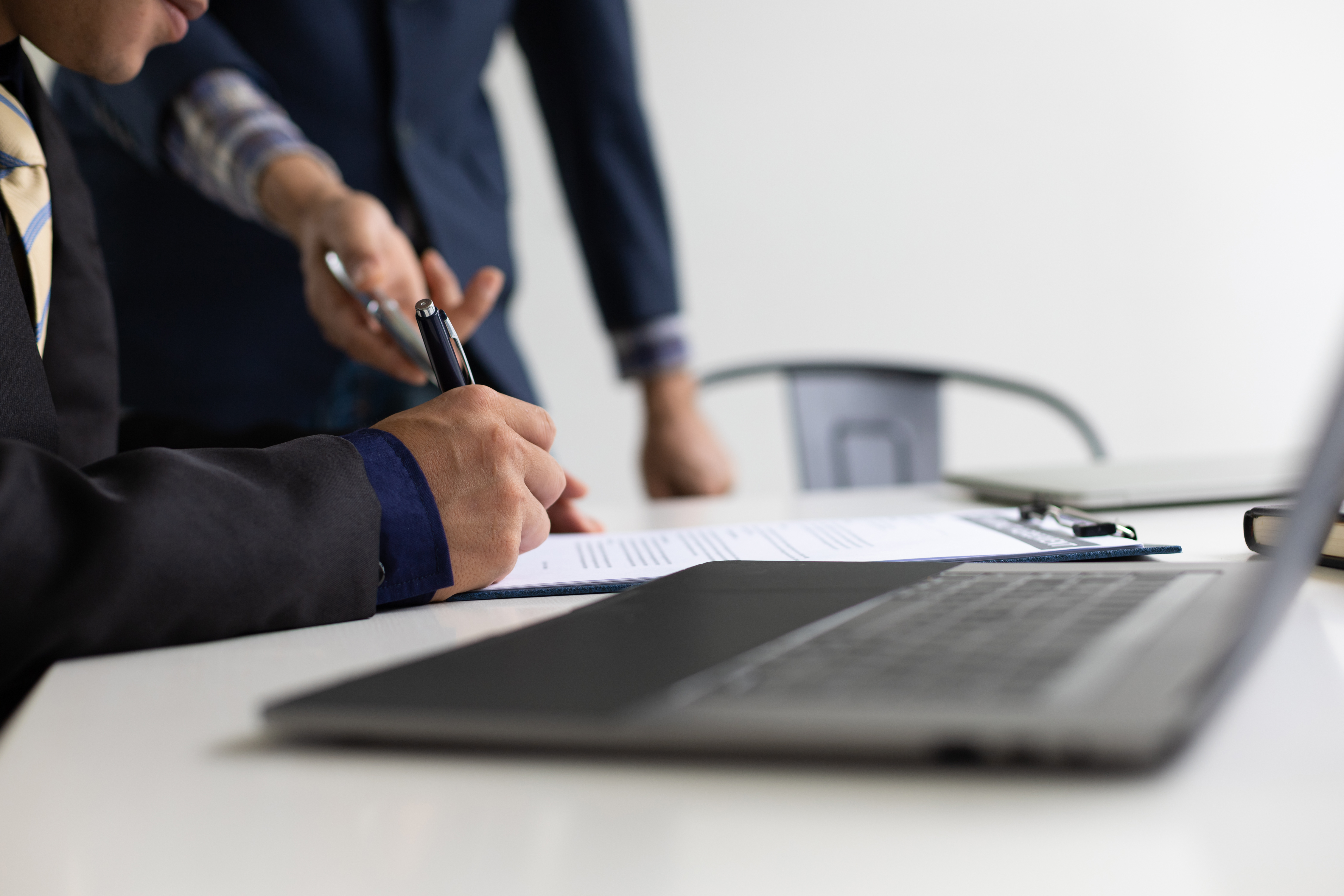 Employee signing a contract