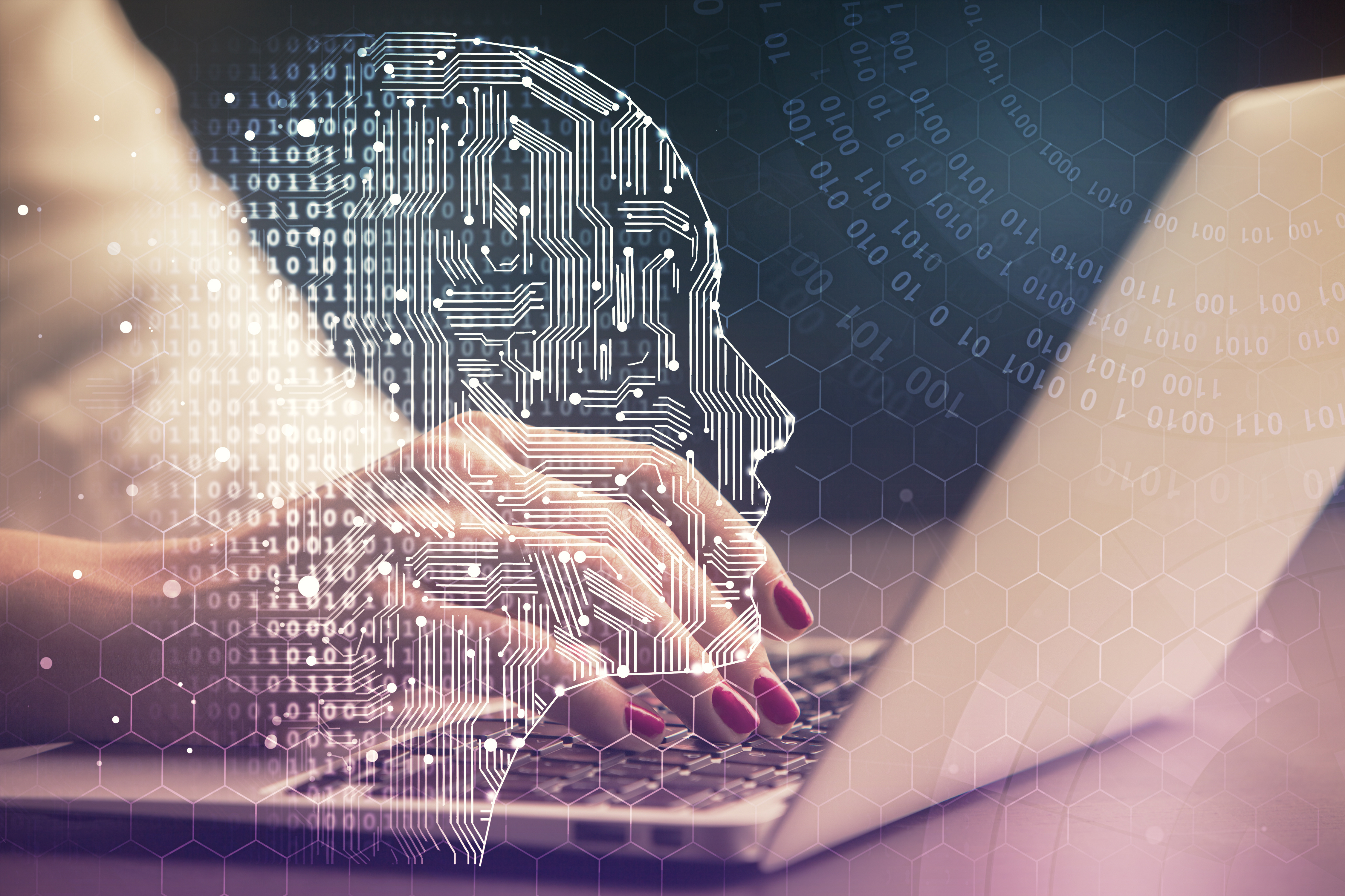 Stock image with a laptop and technology imagery