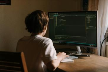Woman working in cybersecurity.