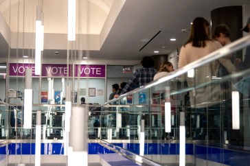 Voters wait in line to cast their ballot in Arlington, Virginia.