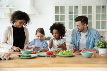 Family making healthy meal