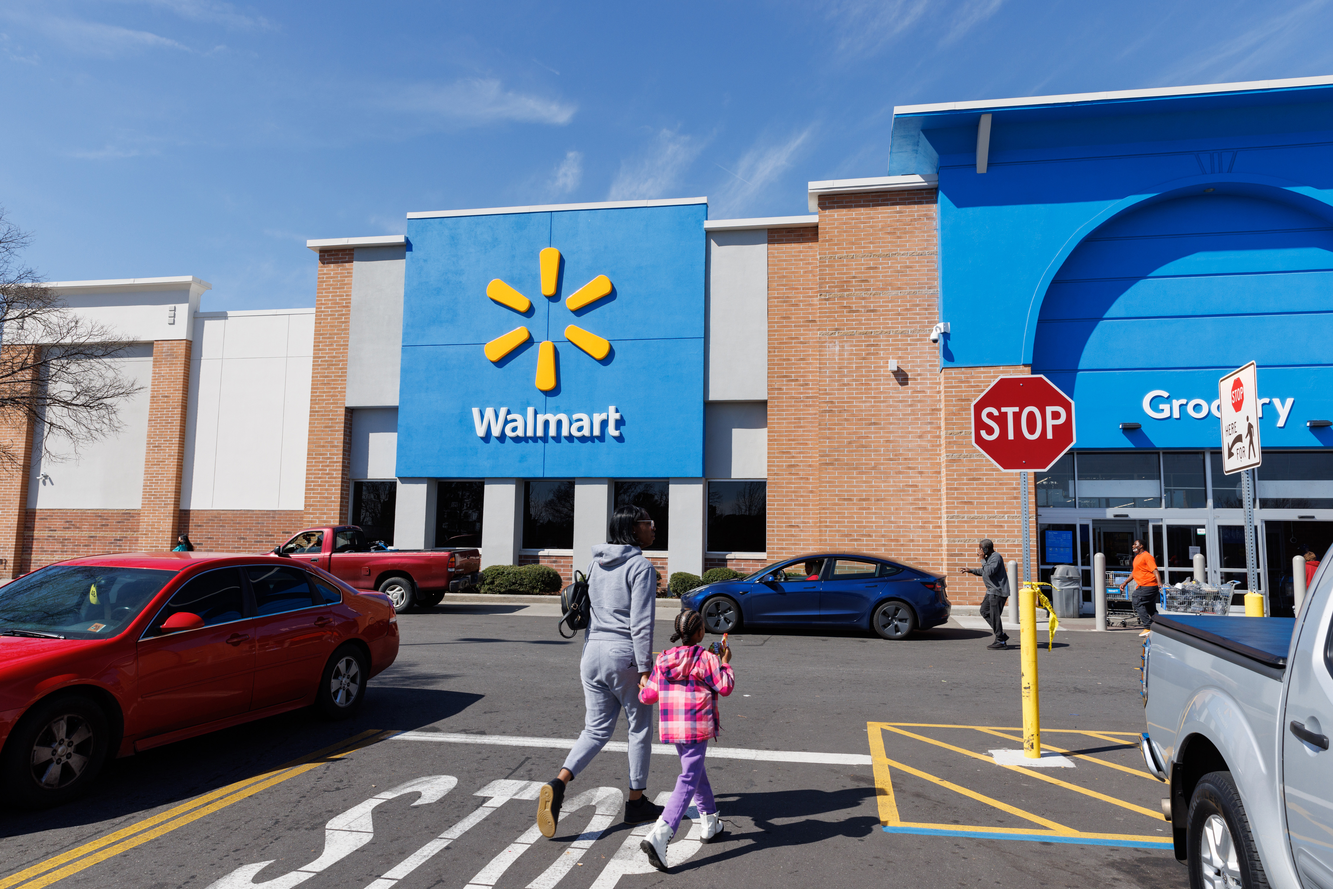 Walmart storefront during the day.