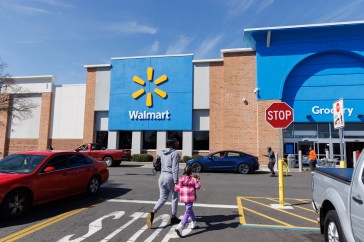 Walmart storefront during the day.