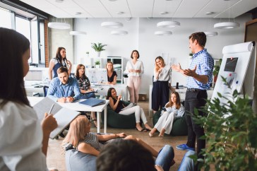 Group of employees meeting in office