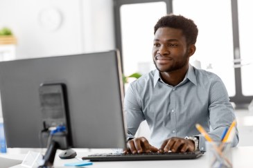 Man working on computer in office
