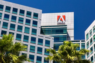 Adobe headquarters in Silicon Valley -- boxy gray building with palm trees in the front.