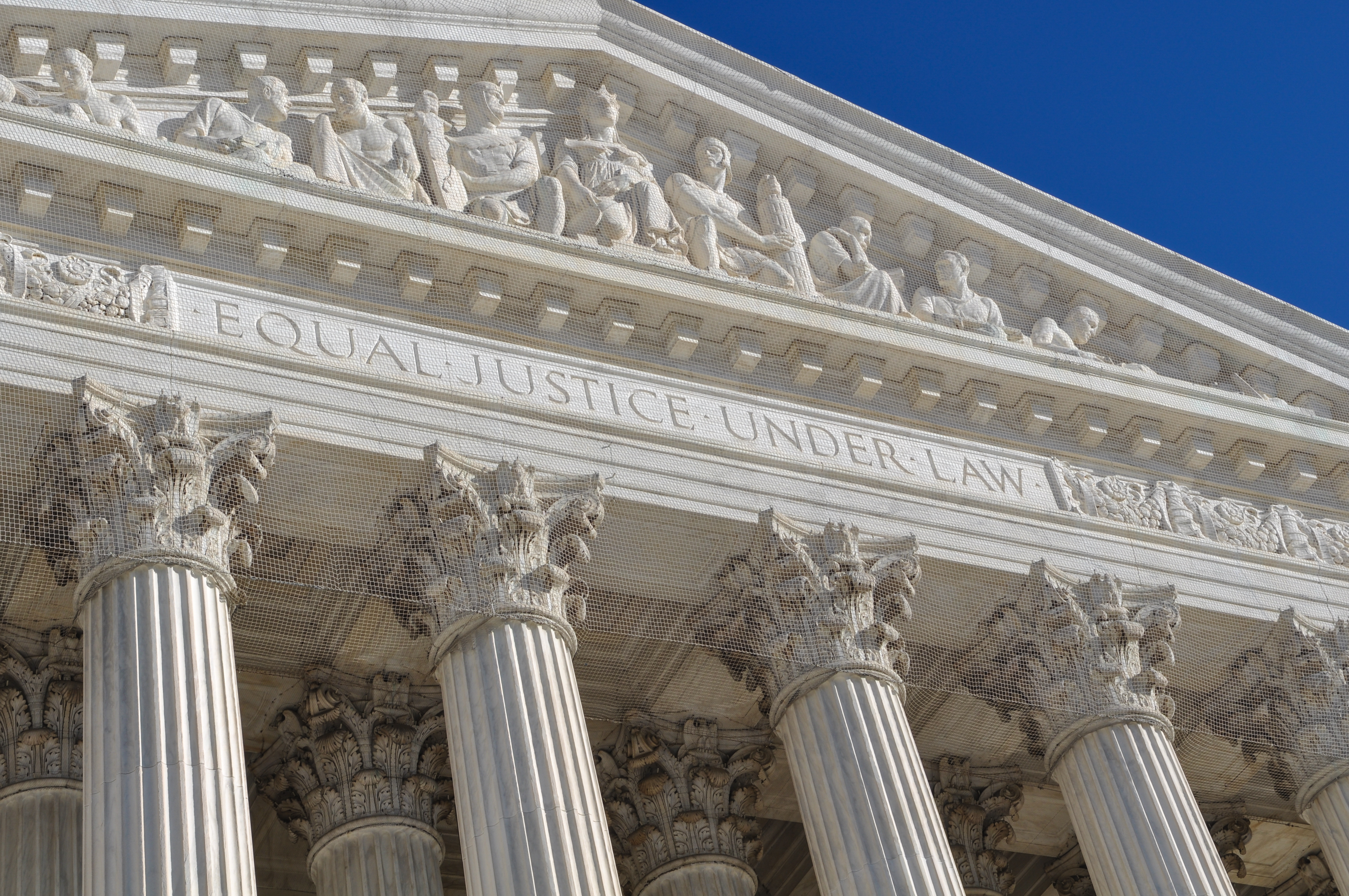 The US Supreme Court, with the words "Equal justice under law" etched on the building.