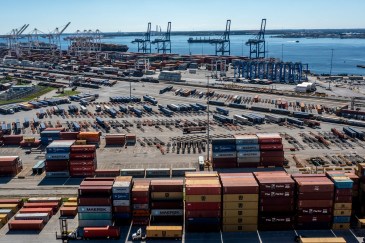 Shipment containers at a dock during the day.