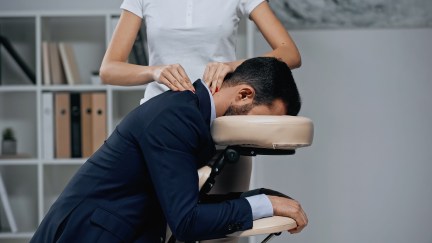 Business man getting a massage