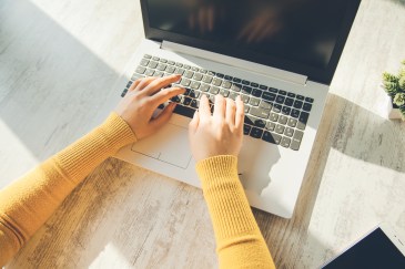 Woman typing on the computer