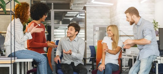 Group of young employees talking