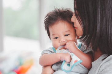 Mom holding baby