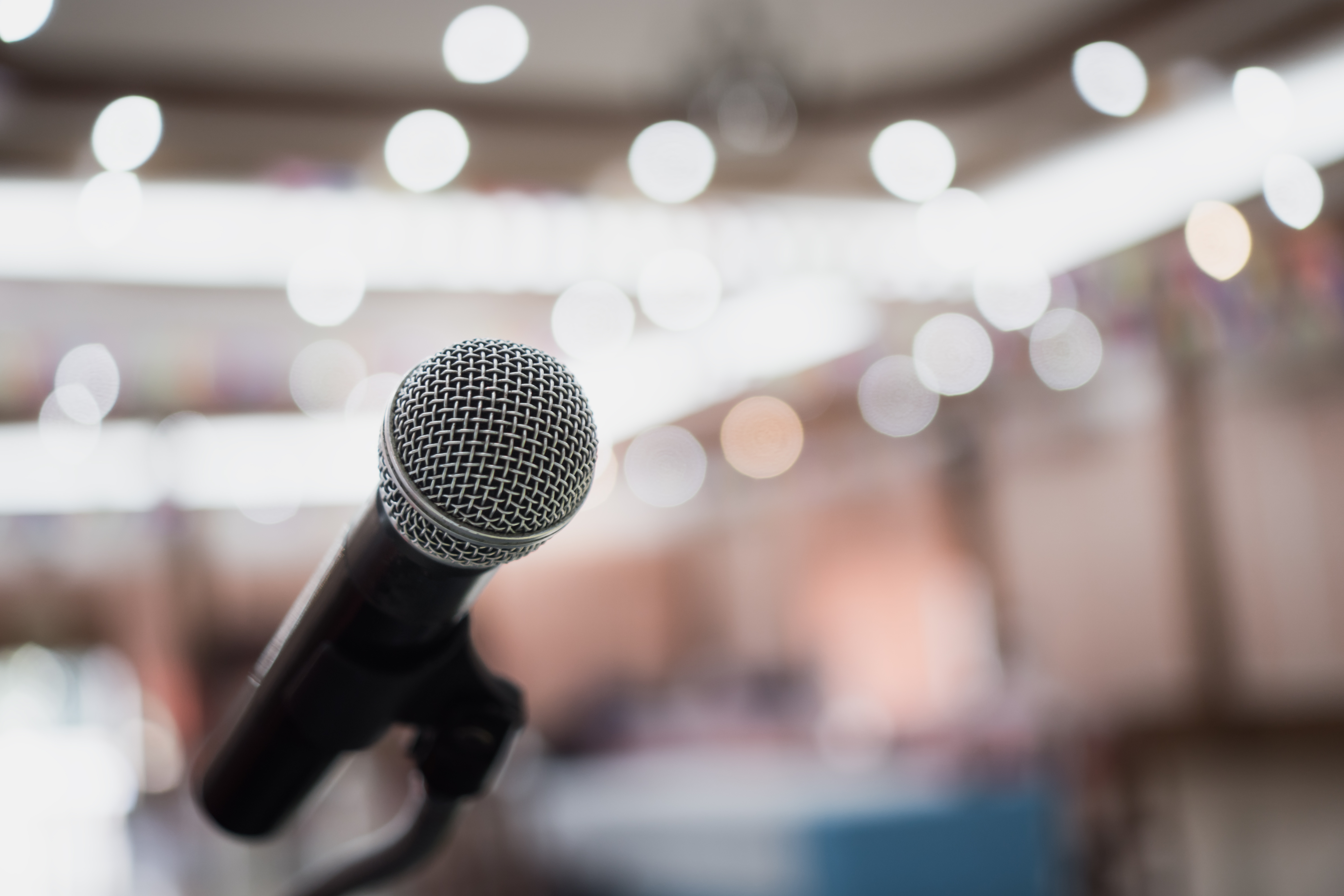 Microphone in front of a blurry background