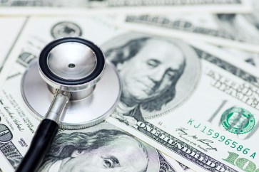 Stethoscope over $100 bills