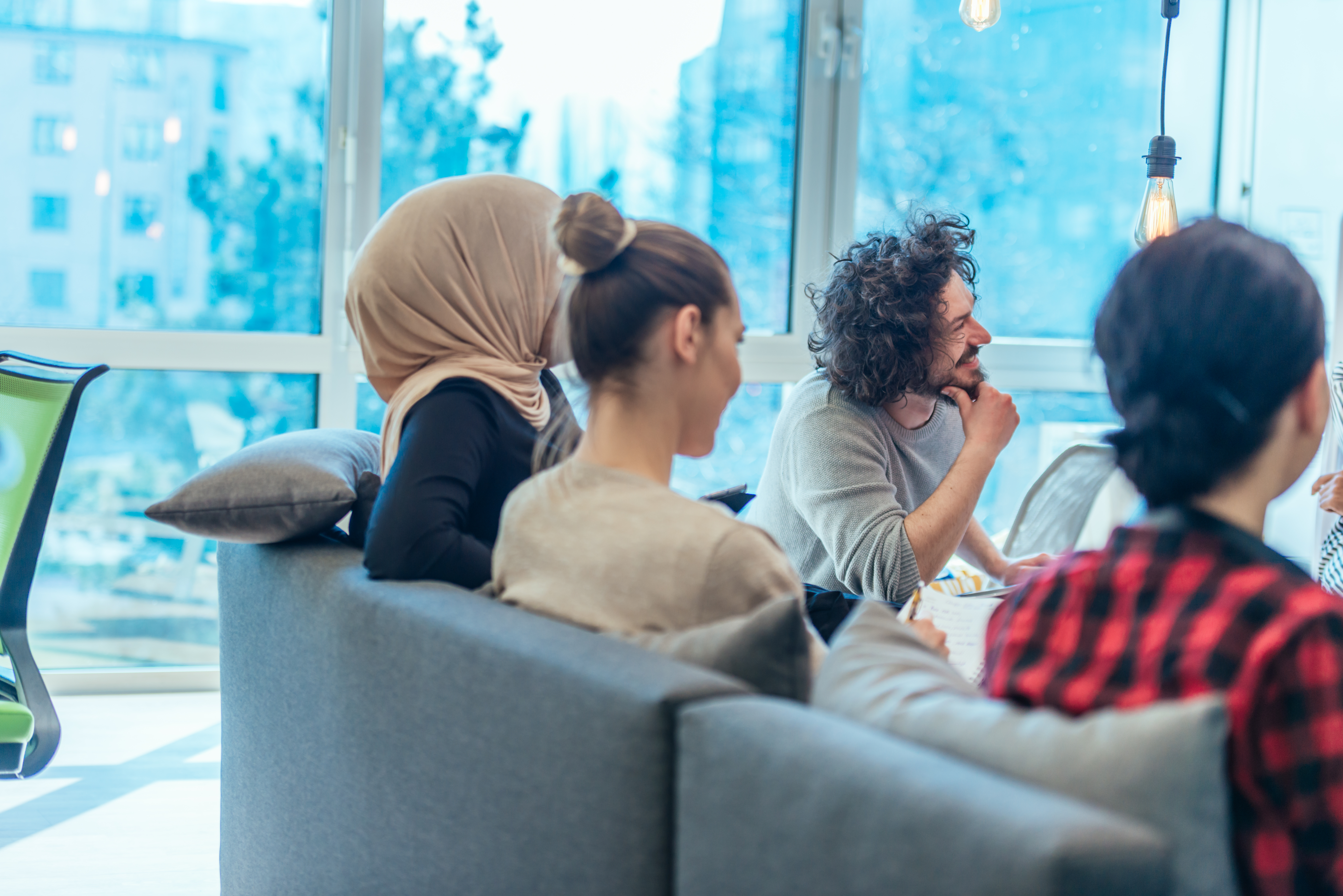 Group of employees hanging out at work