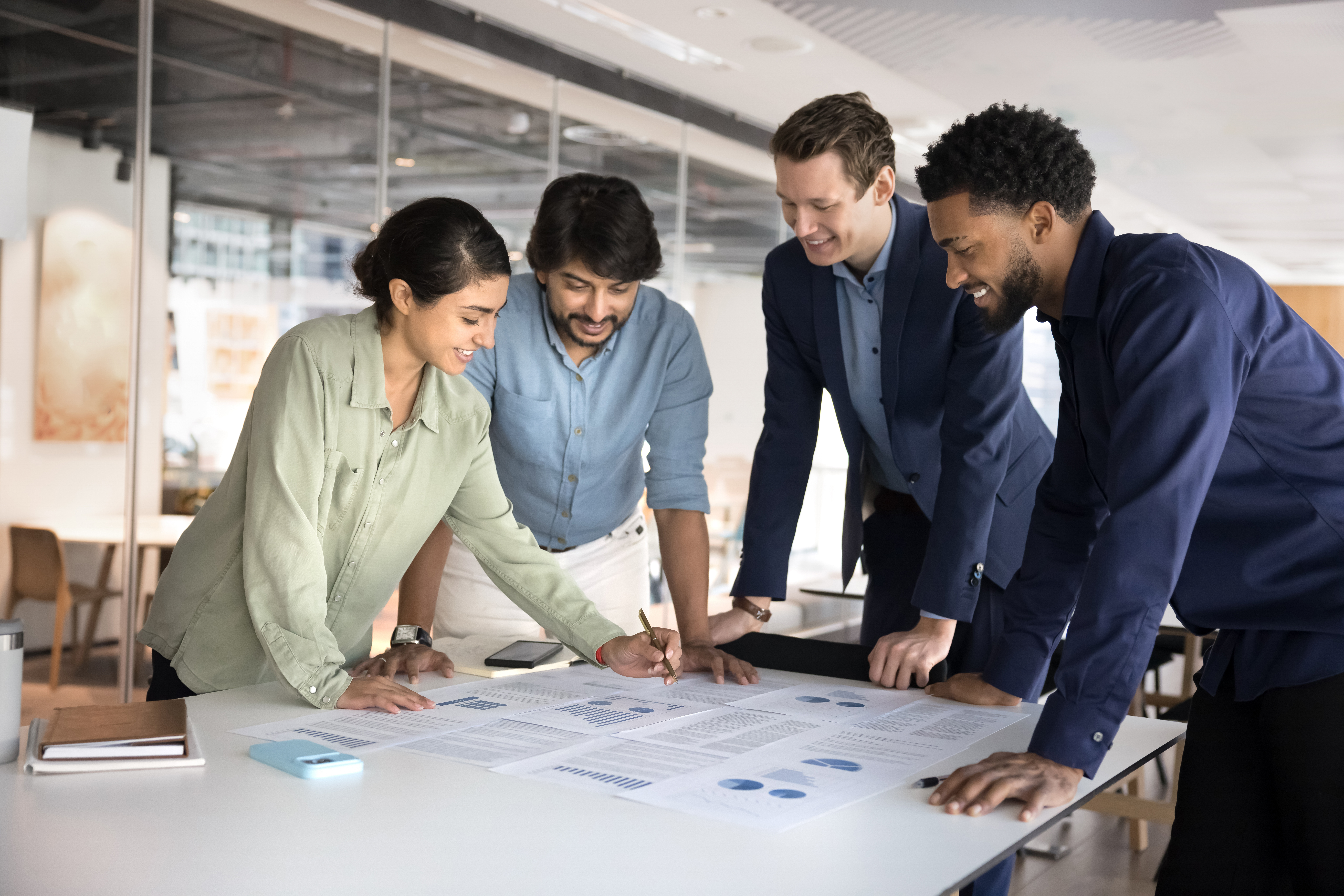 Group of employee working together around table