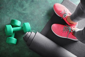 Yoga mat with fitness items