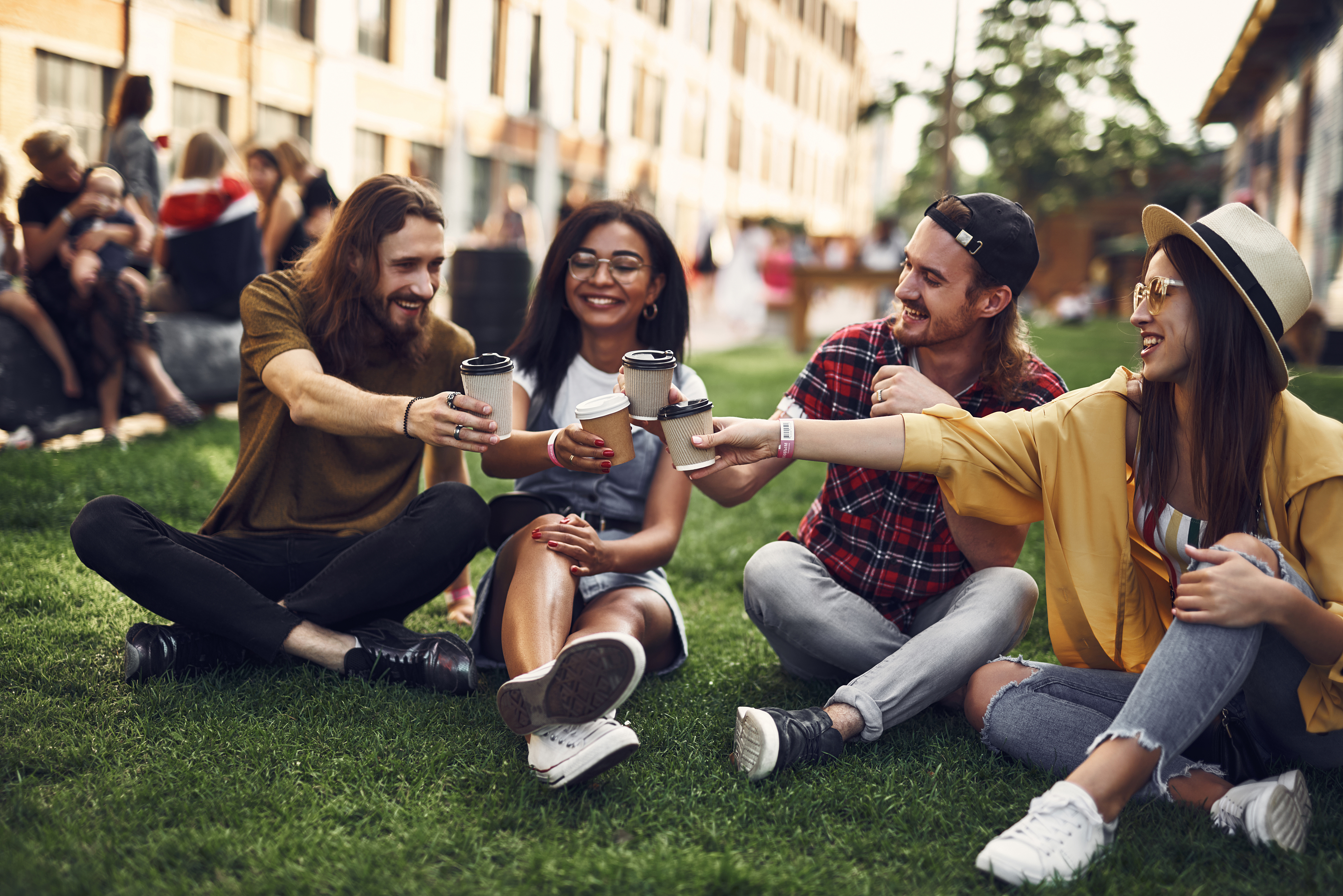 Employees hanging out at a company picnic