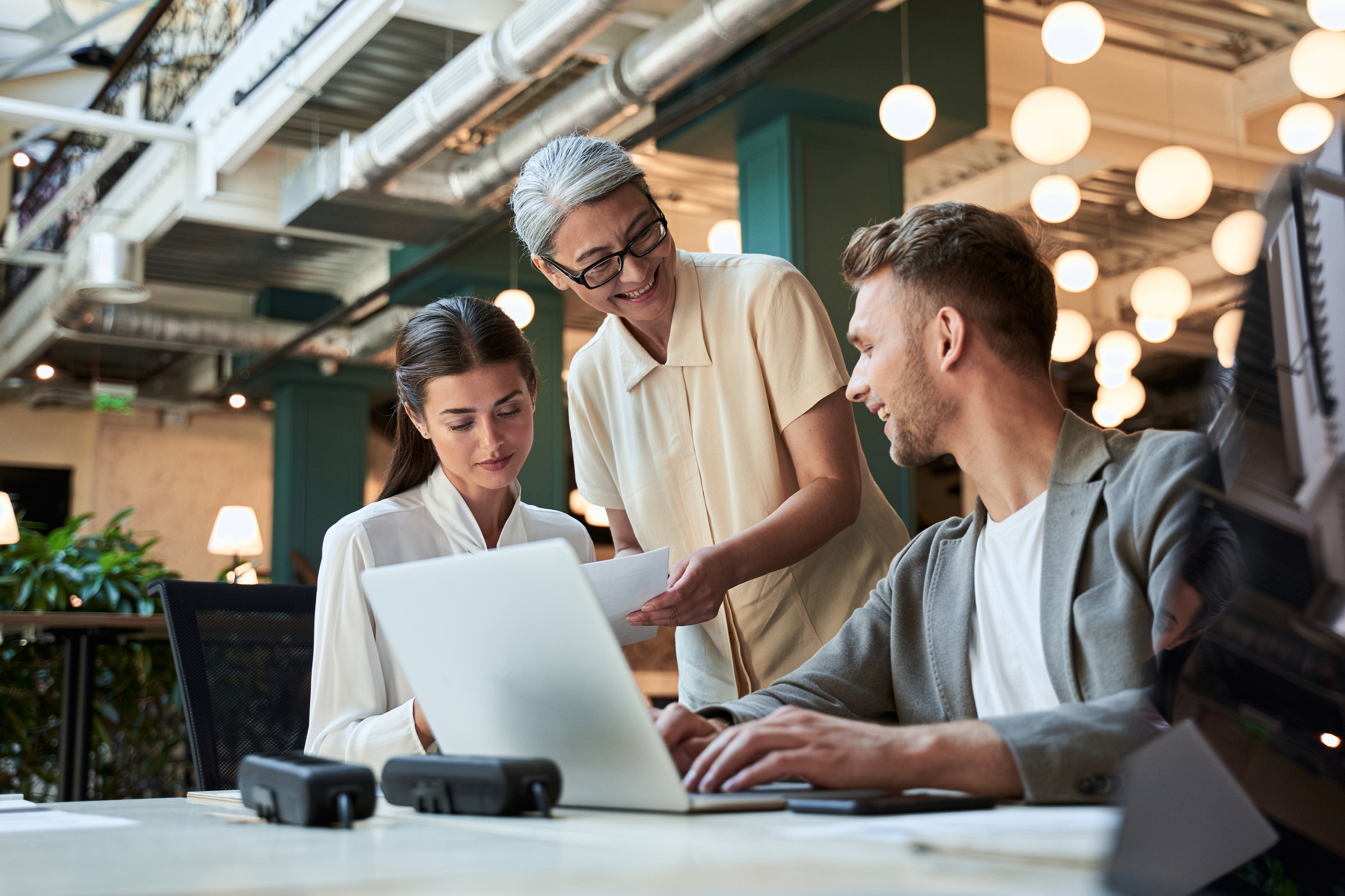 Three employees, multiple generations in office
