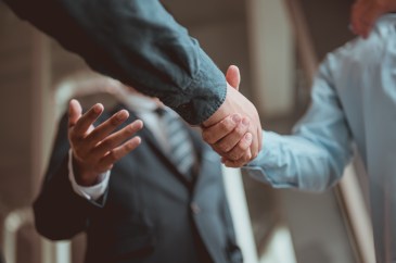 Business people shaking hands
