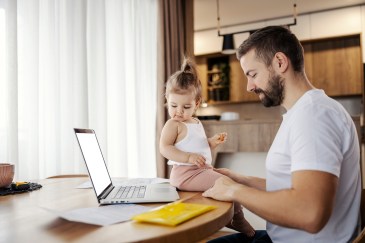 Working dad and daughter together