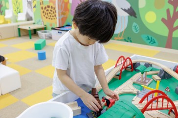 Little boy playing with toys