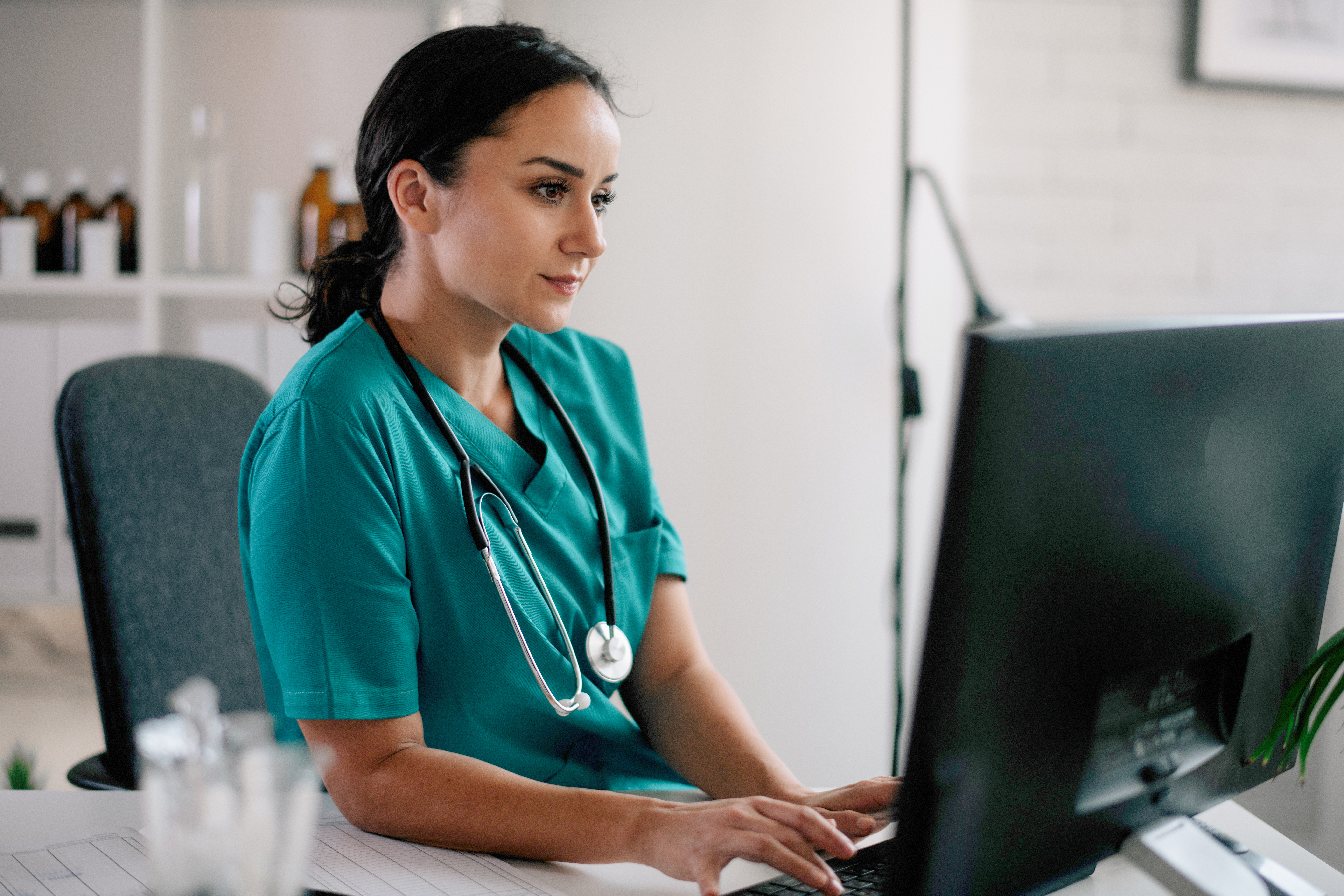 Healthcare professional on computer