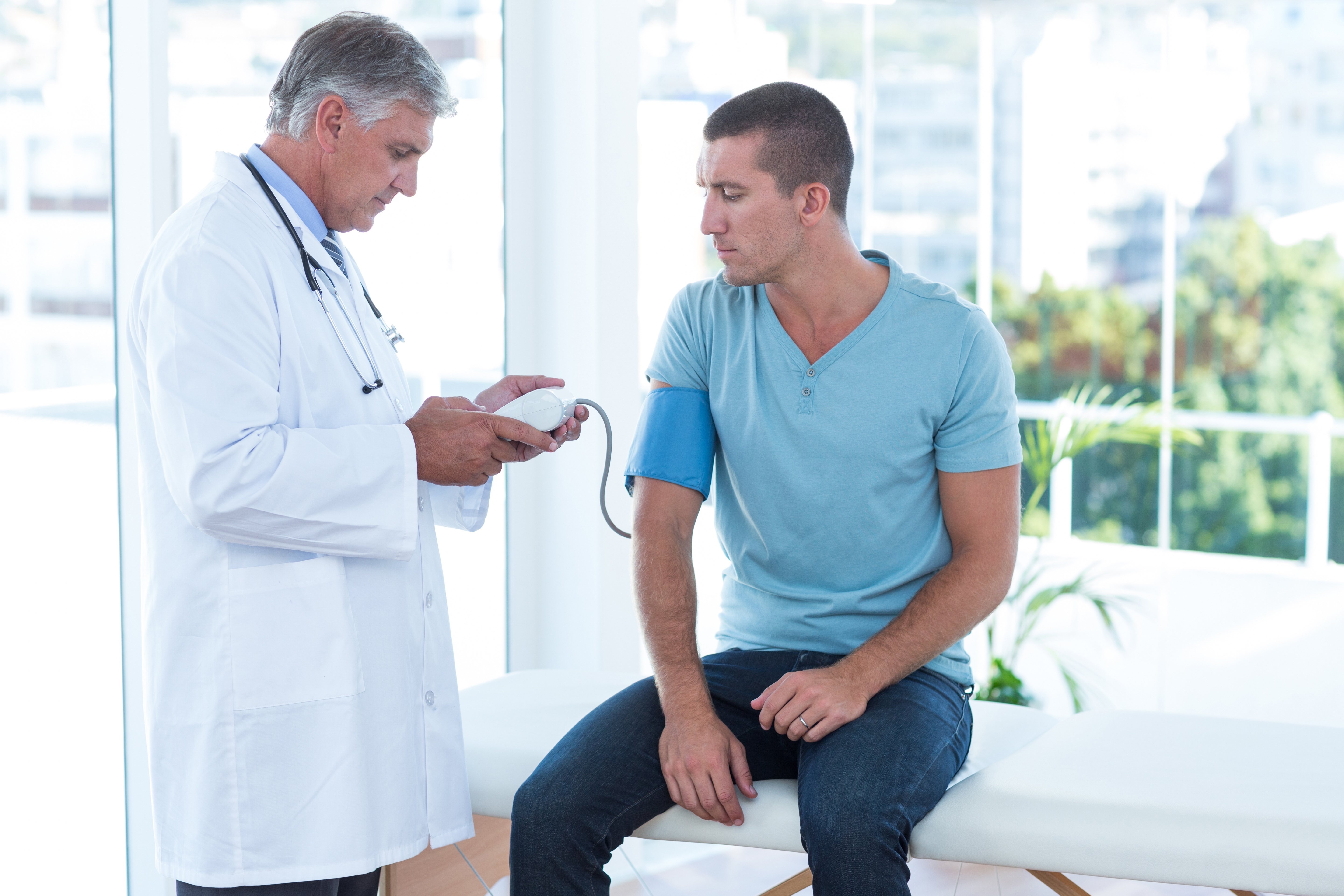 Man getting blood pressure checked