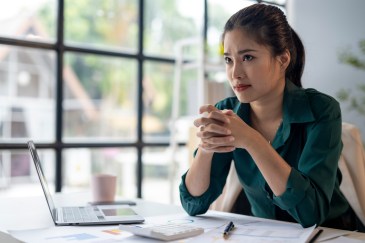Woman looking skeptical at work