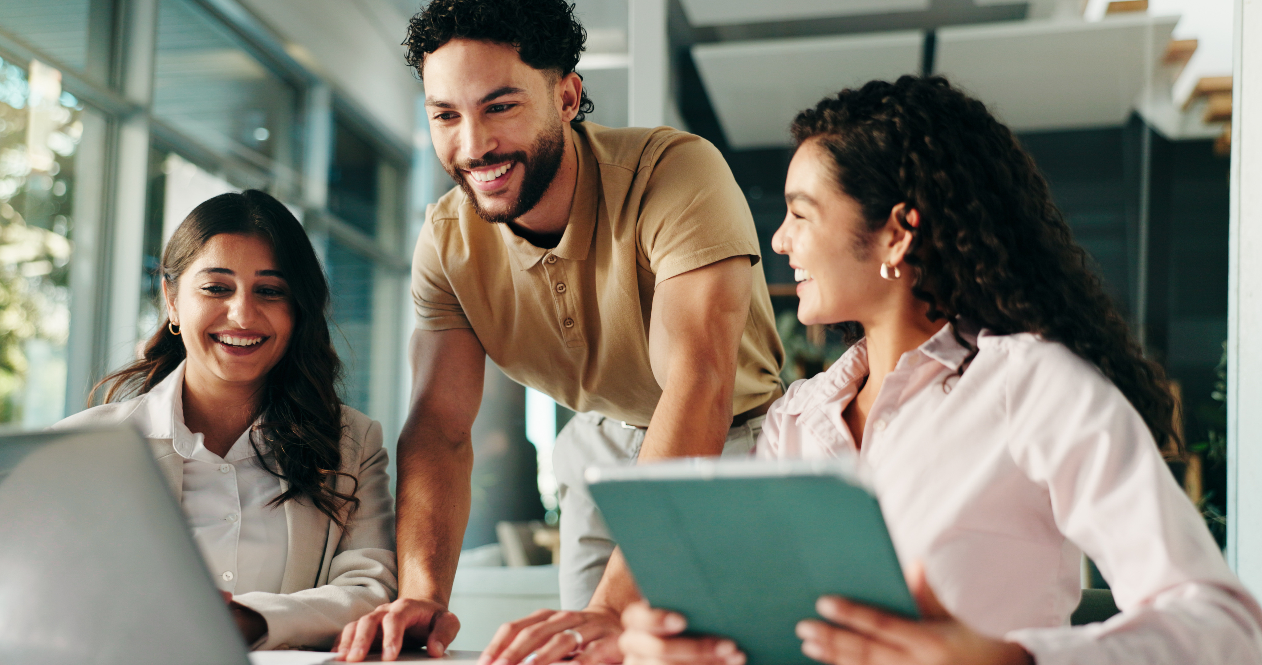 Happy employees working together
