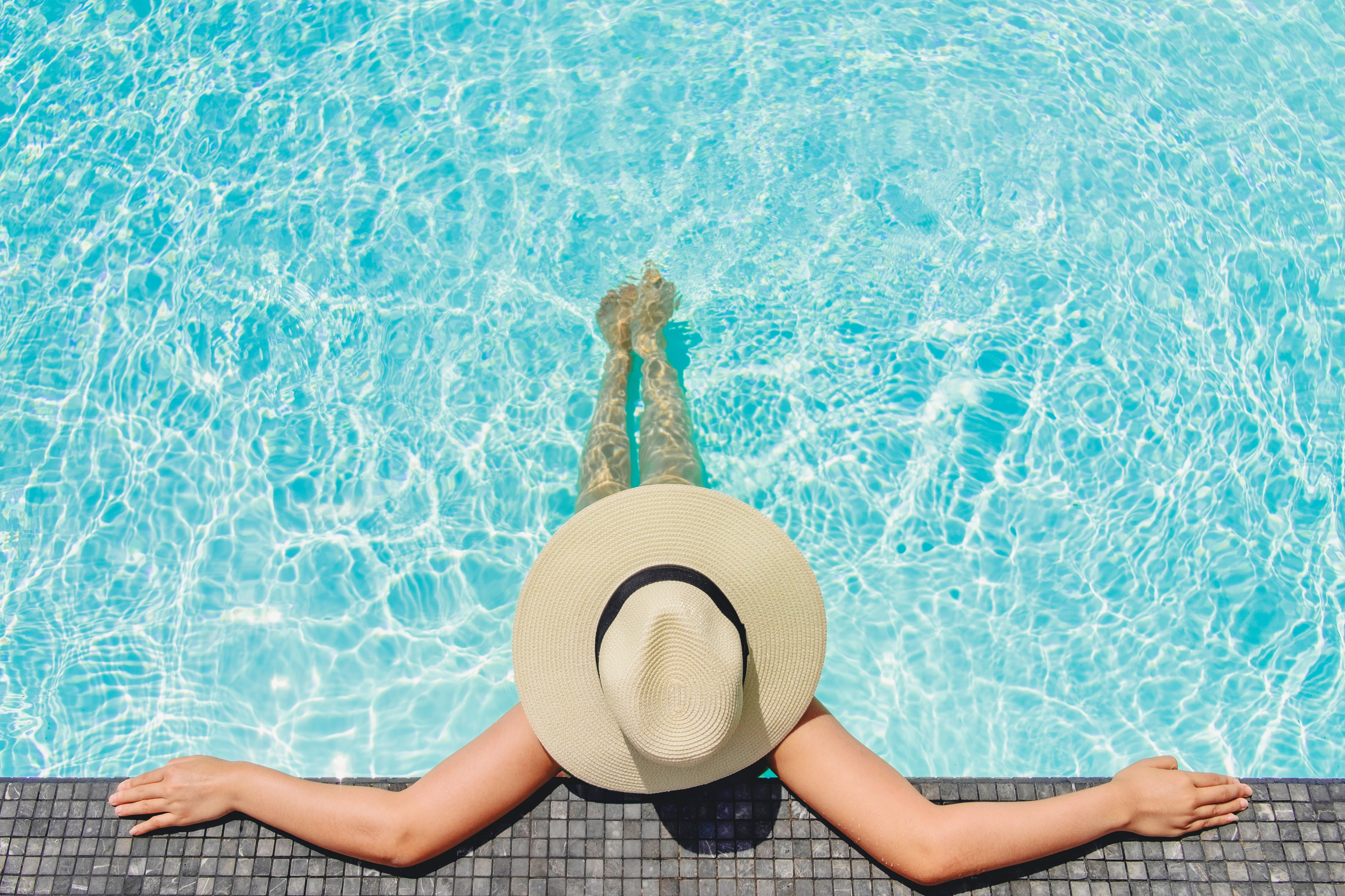 Woman sitting in a pool
