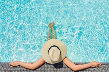 Woman sitting in a pool
