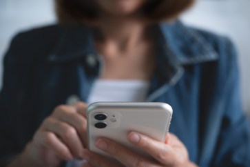 Woman texting on her phone