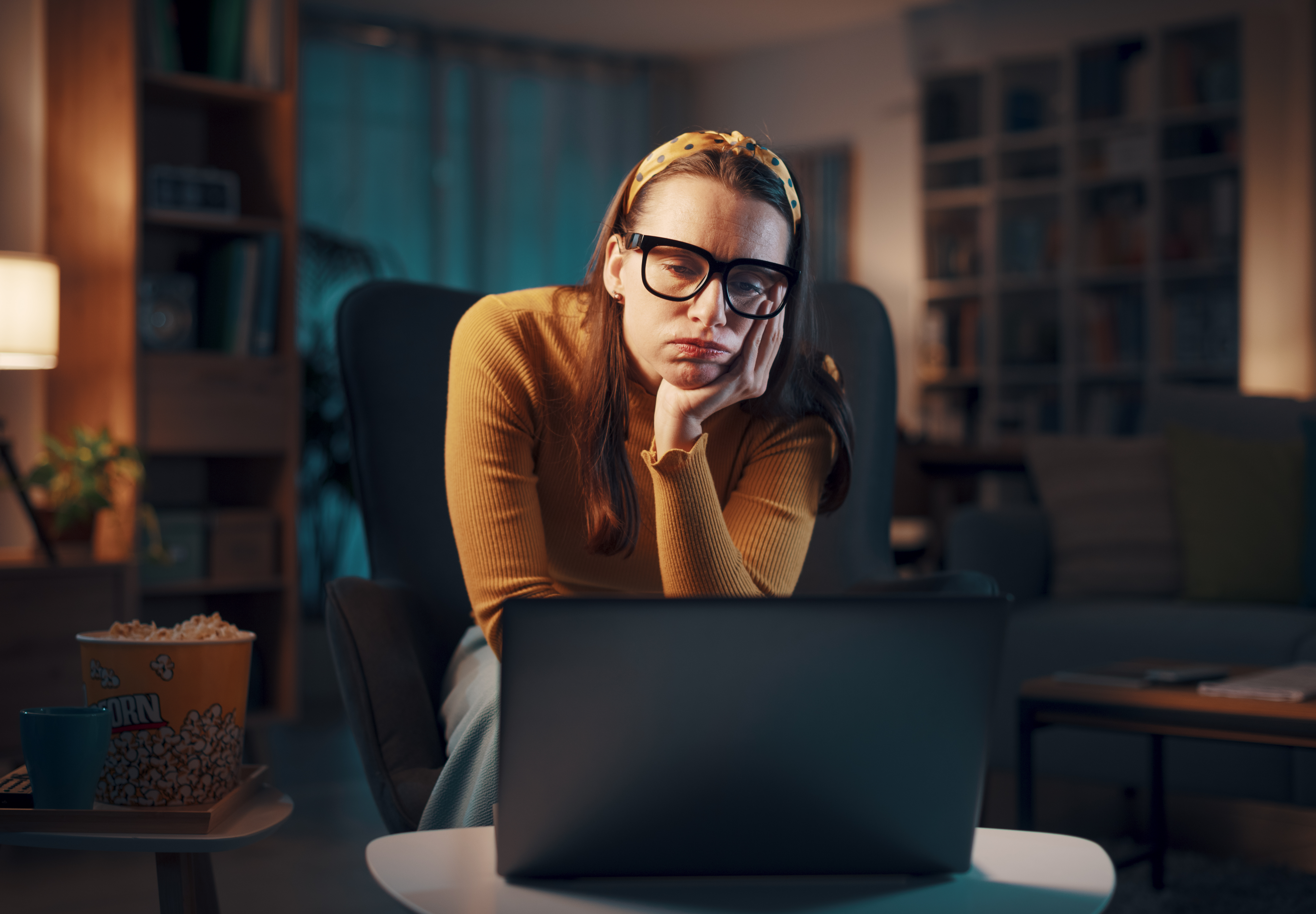 Woman alone at her computer